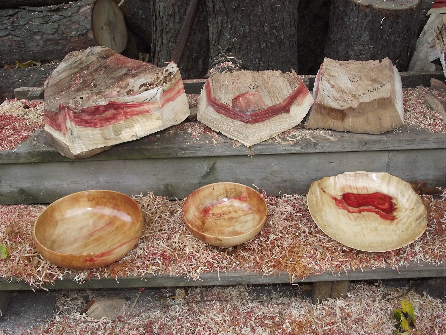A collection of carved wooded bowls.